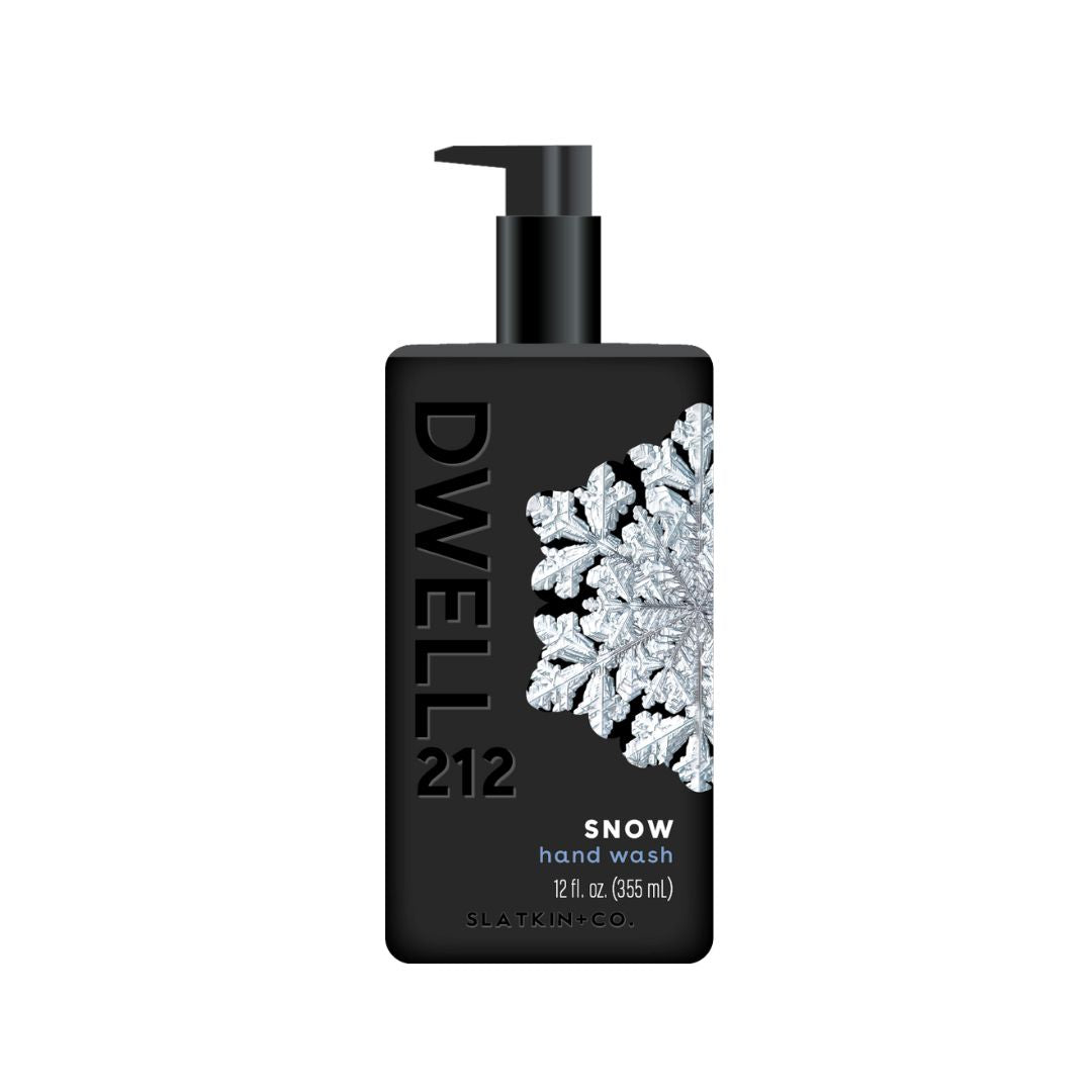 Black bottle of Dwell212 SNOW hand wash, pump bottle with a snowflake design on a white background